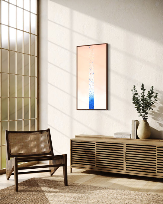 Angled view of Alef, an 18 x 36 inch textured abstract painting, in a solid walnut float frame, showing the depth of the frame.