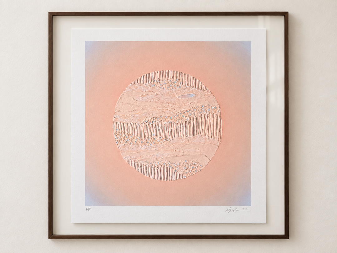 Nuqta framed and hung above a light wood console in daylight, showing the scale of the print in a room